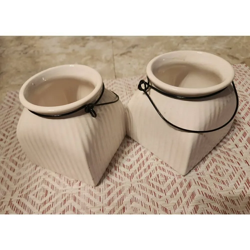 Napco cream ceramic jars with metal wire hangers